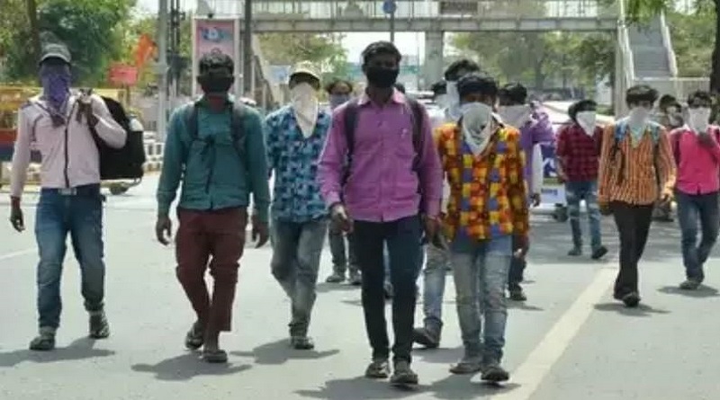 workers walking through jaipur agra