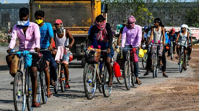 workers on cycle
