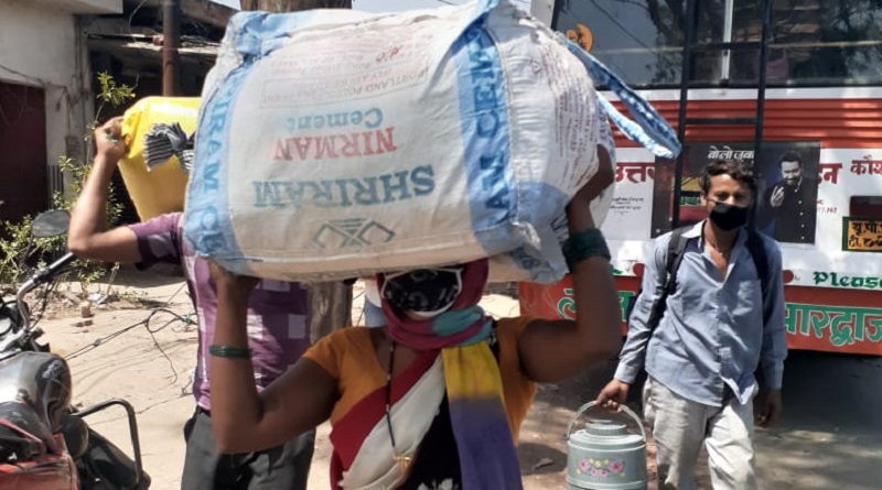 worker rushing to catch bus in ghaziabad