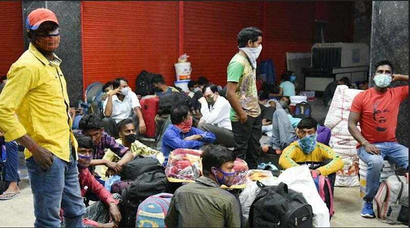 https://www.workersunity.com/wp-content/uploads/2021/04/migrant-workers-in-Karnataka-railway-station.jpg