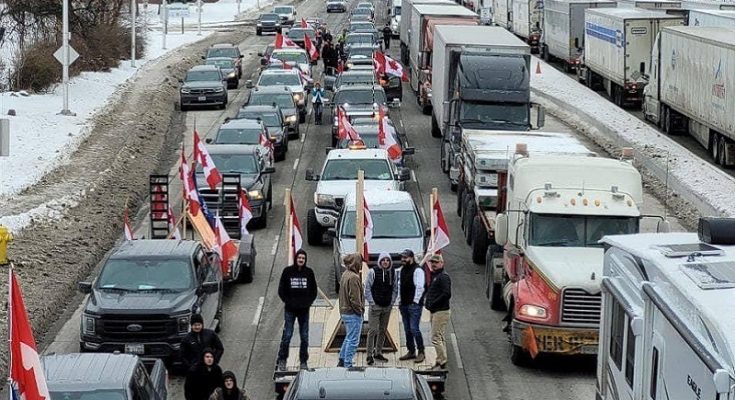 https://www.workersunity.com/wp-content/uploads/2022/02/canada-truck-drivers-protest-site.jpg