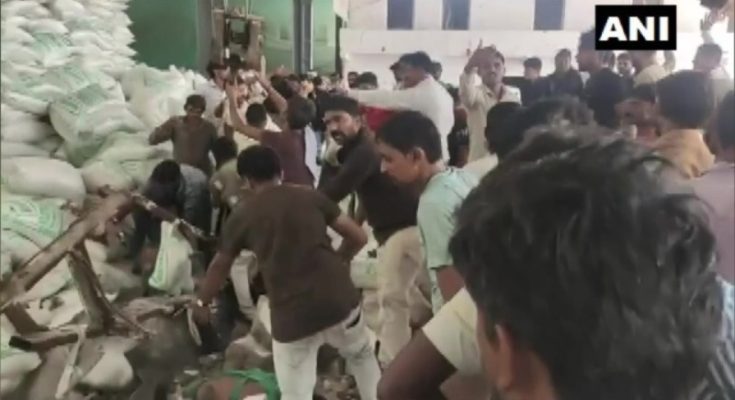 People in a frenzy after wall collapse in salt factory