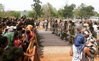 Adivasi protesters and paramilitary personnel face off at Silger