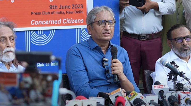 https://www.workersunity.com/wp-content/uploads/2023/06/Ravish-Kumar-speaks-at-Umar-khalid-1000-days-in-jail-program.jpg